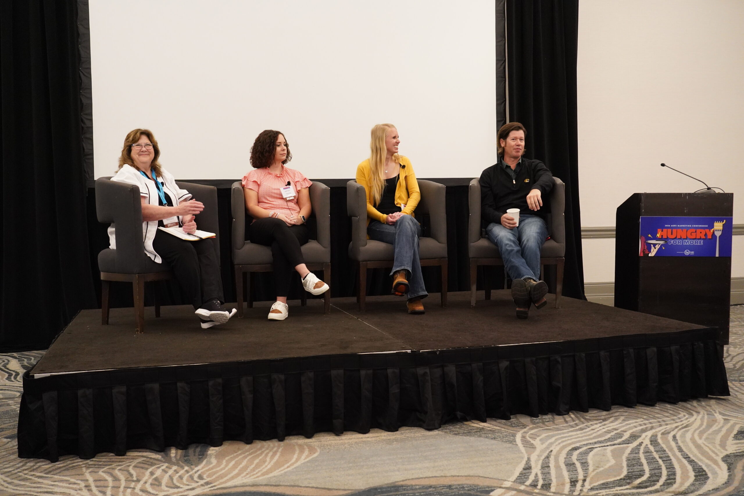 Farm Voice panel at NAMA with three farmers sharing their perspectives on innovation